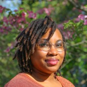 Black Women In pink blouse