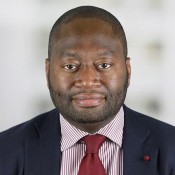 black man in red tie and button down