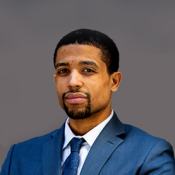 BLACK MAN IN BLUE TIE AND BLAZER