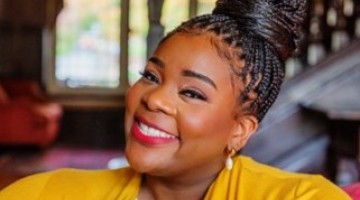 Black woman yellow blouse